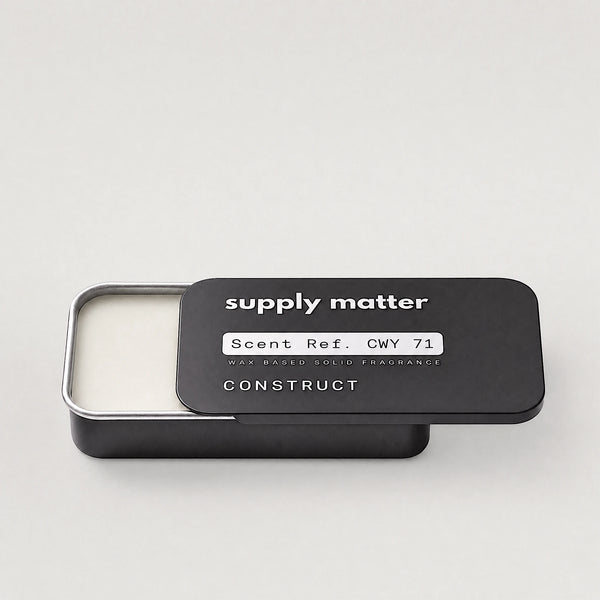 CONSTRUCT solid cologne tin, angled side view