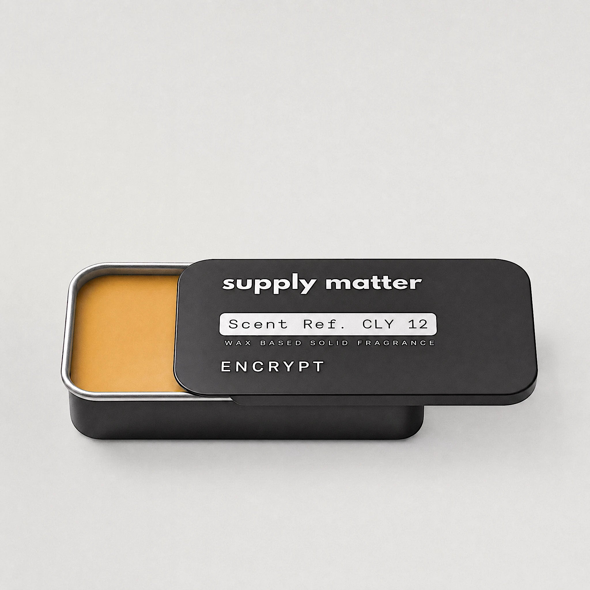 ENCRYPT solid cologne tin, angled side view