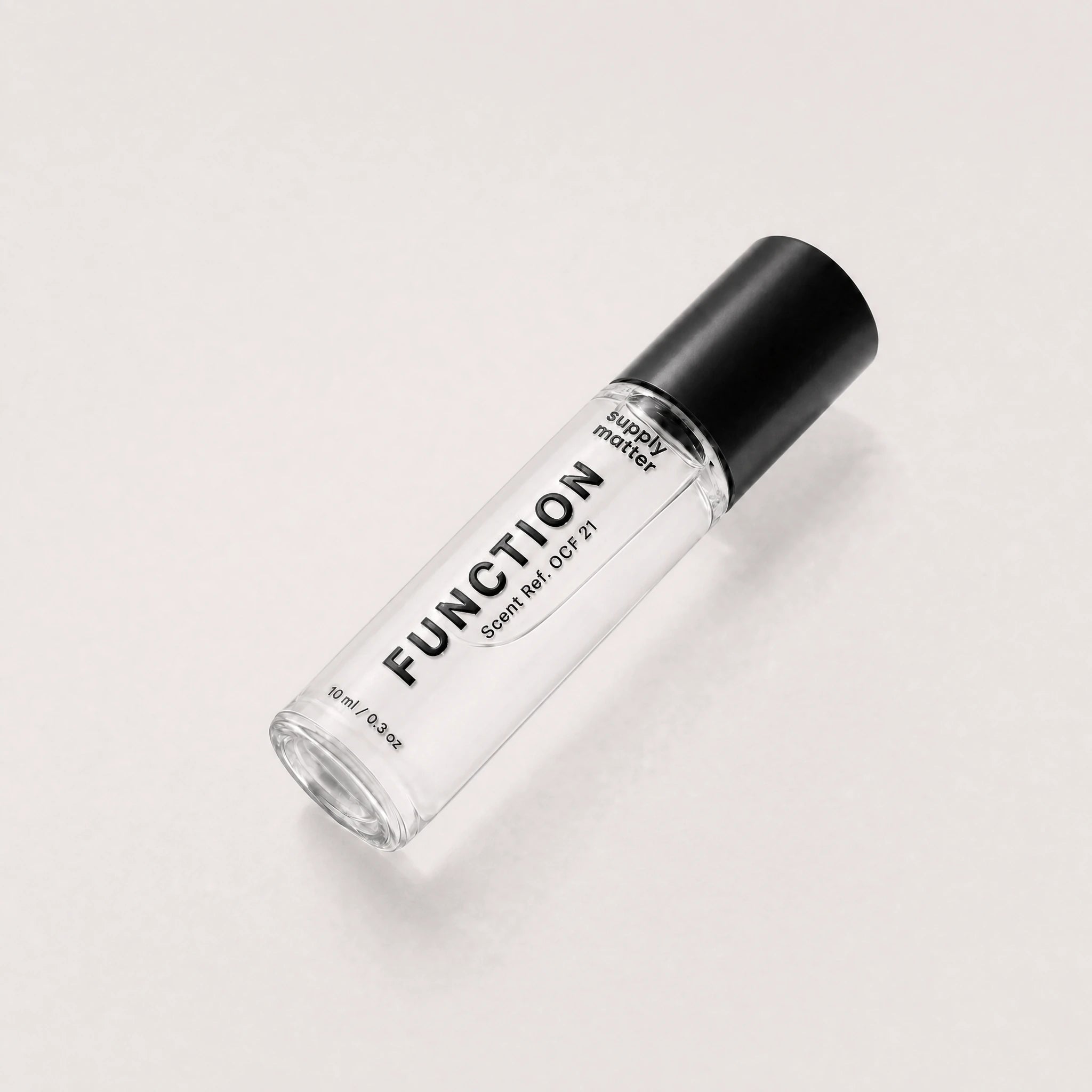 FUNCTION liquid cologne bottle, angled side view