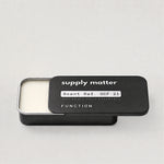 FUNCTION solid cologne tin, angled side view