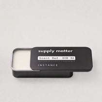 INSTANCE solid cologne tin, angled side view
