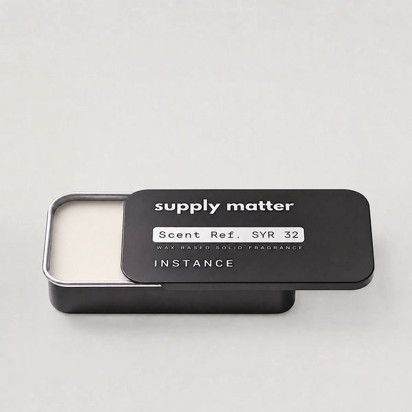 INSTANCE solid cologne tin, angled side view
