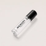 MEMORY liquid cologne bottle, angled side view