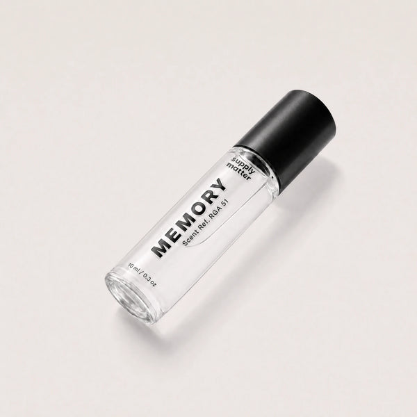 MEMORY liquid cologne bottle, angled side view