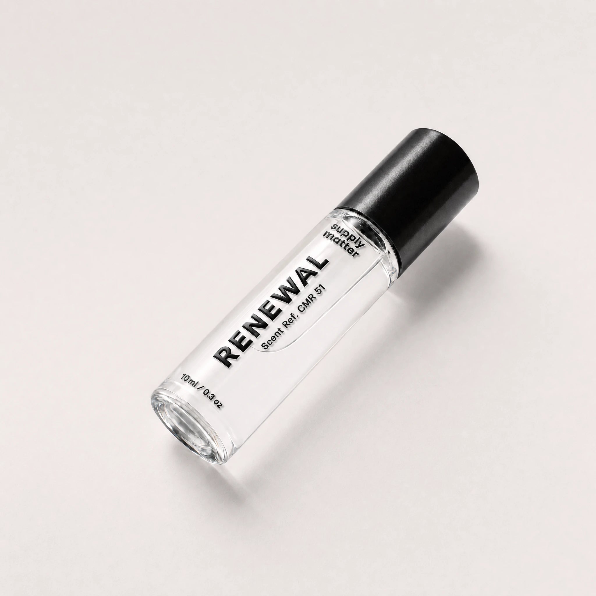 RENEWAL liquid cologne bottle, angled side view